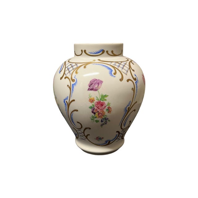 A Pair of Beautifully Hand Painted Porcelain Ginger Jars with Lids stamped Czechoslovakia with a blue seal. These jars...