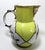 This is a very unique and old little pitcher. Hand painted with sweet flowers and there is a face on the spout. The...