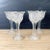 Set of 4 curious Victorian EAPG glasses. Tall glasses have petaled flared edges and shallow bowl. Outside has a daisy and...