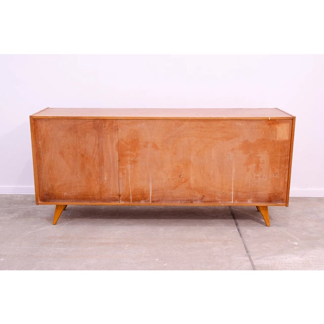 A popular Vintage sideboard model U-460 from the 1960´s. It was designed by Jiri Jiroutek for Interier Praha. It features...