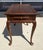 This Ethan Allen tea table is crafted in solid cherry and features a classic Queen Anne design with graceful cabriole...