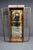 Henredon “Scene One” curio cabinet in oak, made in Morganton, North Carolina. Features full glass doors with inset brass...