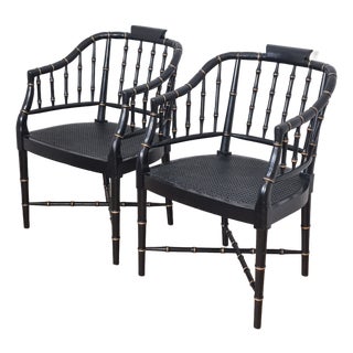 Late 20th Century Baker Furniture Attrib. Black & Gold Regency Faux Bamboo Cane Seat Arm Chairs, a Pair For Sale