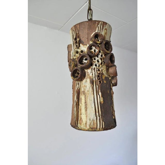 Organic designed sculptural cylindrical pendant by Bodil Marie Nielsen, Denmark 1950s-1960s. The top stamped: Bodil Marie...