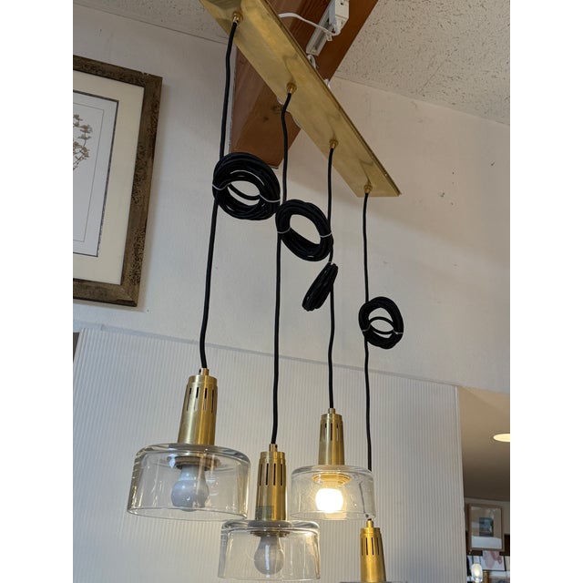 Contemporary Visual Comfort Iris Quatro Linear Pendant in Hand Rubbed Antique Brass With Clear Glass For Sale - Image 3 of 12