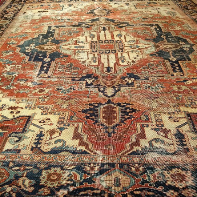 "Discover a true masterpiece of Persian weaving with this magnificent Mid-19th Century Antique Serapi Area Rug. Hand-woven...