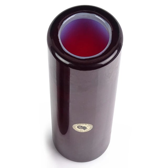 Beautiful vintage Murano hand blown dark oxblood red over opalescent white Italian art glass flower vase. Documented to...