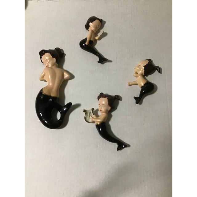 Palm Beach Coastal Figural Wall Hanging Set 4 Rare Set with closed eyes Very hard to find a set of 4 Larger one about 8"...