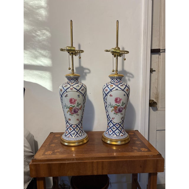 Pair French Sevres Style Floral Hand Painted Porcelain Vase. Professionally Mounted into Lamps. Vase dimensions are Width...