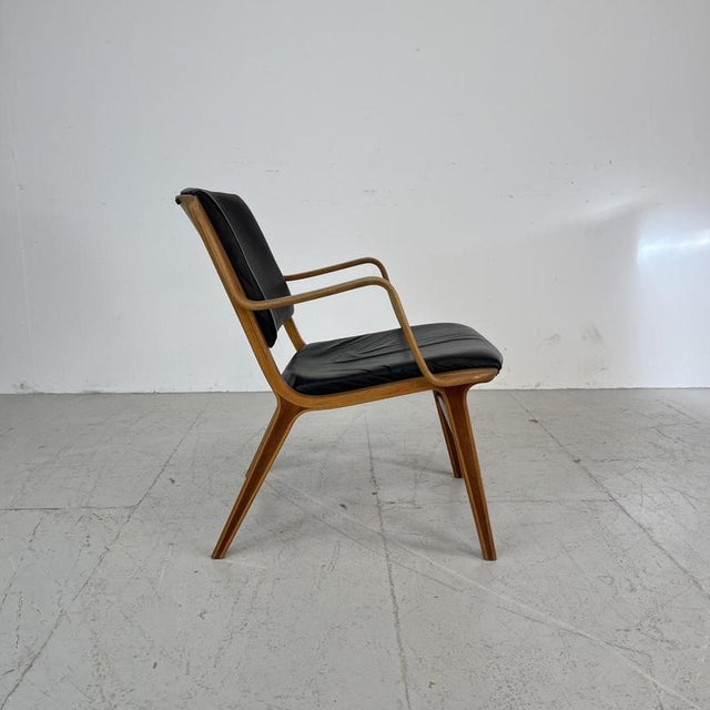 Gorgeous 1960s Ax Chair by Peter Hvidt & Orla Mølgaard for Fritz Hansen of Denmark. Designed in 1947 using revolutionary...
