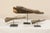 A collection of three carved wood crocodile head boat prows from Papua New Guinea. These mid-20th century Papua New...
