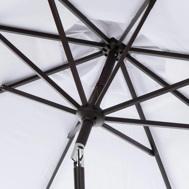 Conjure images of the Riviera with a classic market umbrella for dining al fresco at a romantic café. Keep cool on any...