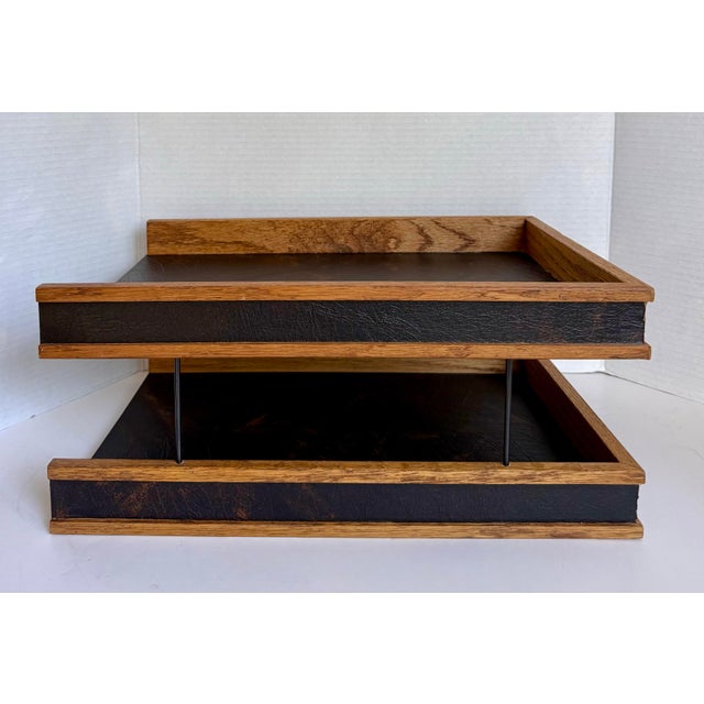 Here is a beautifully designed mid-century modern two-tier desk organizer, likely dating to the 1960s, featuring a warm...