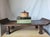 A soulful, hand-carved pedestal with a stunning 'winged' silhouette—perfect as a sculptural riser for the modern home. An...