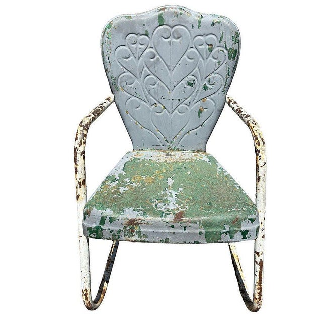 Steel Mid-century Springer Outdoor grey and green enamel Lounge Chair. The chair features a round tubular U-shaped base...
