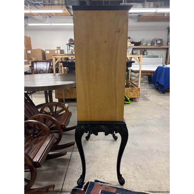 A very early 1940's mid century modern standing bar in burled maple with lacquered handcarved cabriole legs and crown. A...