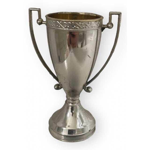 Set of Four assorted sized silver vessel, vase-trophies. The patina is perfect on these little Beauties. They were hand...