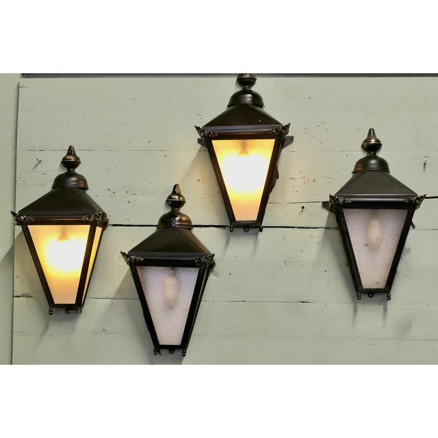 These are traditional style Wall Lanterns they are made in brass and painted black, they have 3 glazed sides and they sit...