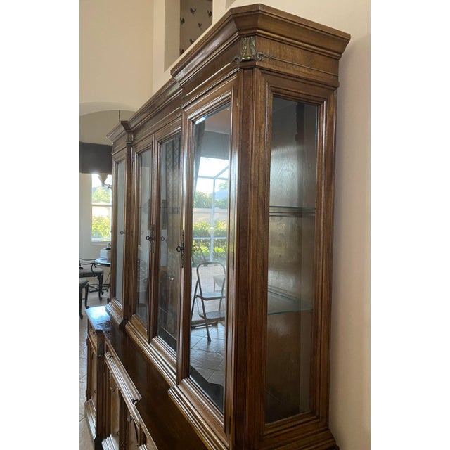 Our beautiful breakfront has been in my family's home since before I was ... and is the most beautiful one I've seen. Did...