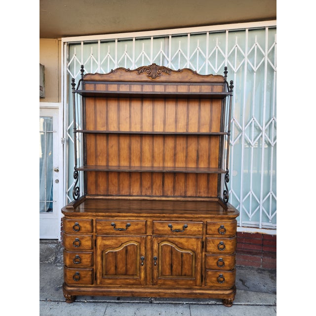 is a 2 piece set. The bakers rack comes apart from the main hutch and is attached via a metal plate and screws and is very...