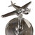Art Deco chrome side table featuring a light-up airplane in the center, fashioned after the iconic Douglas DC-3, with an...