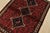 An authentic vintage tribal Shiraz rug hand-knotted with fine wool and natural dyes. This nomadic rug features geometric...