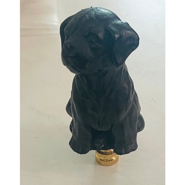 Cute puppy dog figurine mounted on brass as lamp finial.