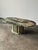 Carved from a dramatic slab of green Cipollino Ondulato marble, this oval coffee table is defined by sweeping bands of...