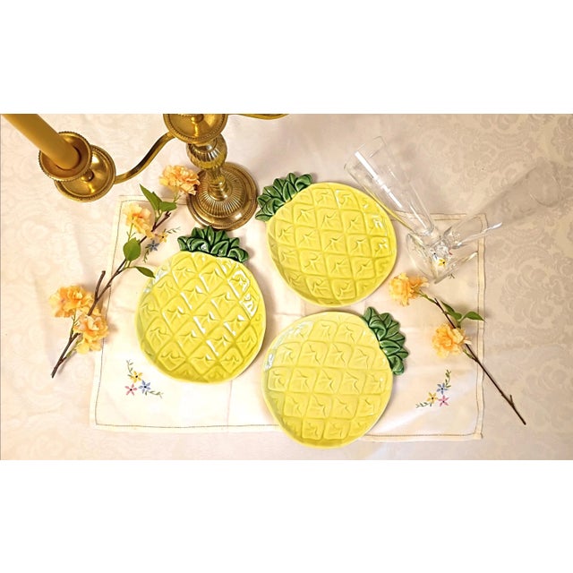 This vintage set of three Cemar California pottery salad plates features a deeply embossed pineapple pattern in a vibrant...