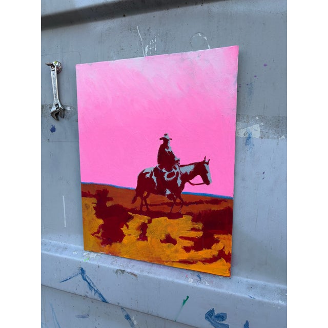 This 20 x 16 original acrylic painting on canvas board is popping with color. The cowboy rides the dusky trail at the end...