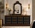 A commanding vintage lowboy dresser, circa 1970s, attributed to Drexel, thoughtfully reimagined in a refined designer...