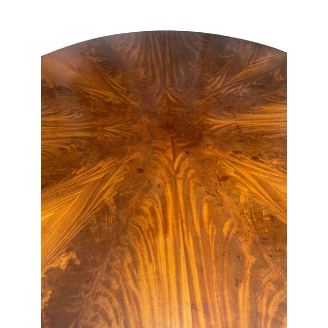 A handsome 19th century mahogany tilt-top breakfast table of exceptional scale and quality, featuring a five-foot circular...