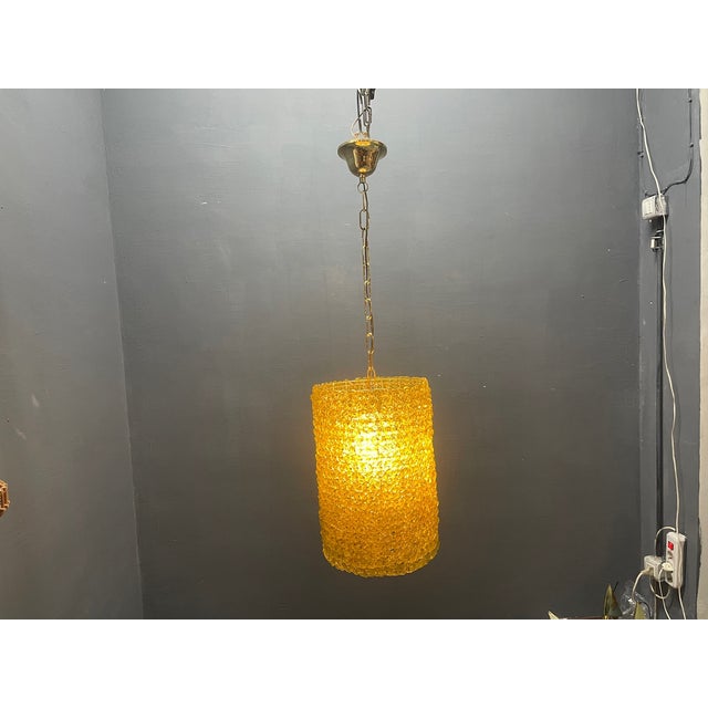 Set of Two Olive Green Murano Glass Flower Pendants, 1980s These striking 1980s pendant lights are crafted from a...