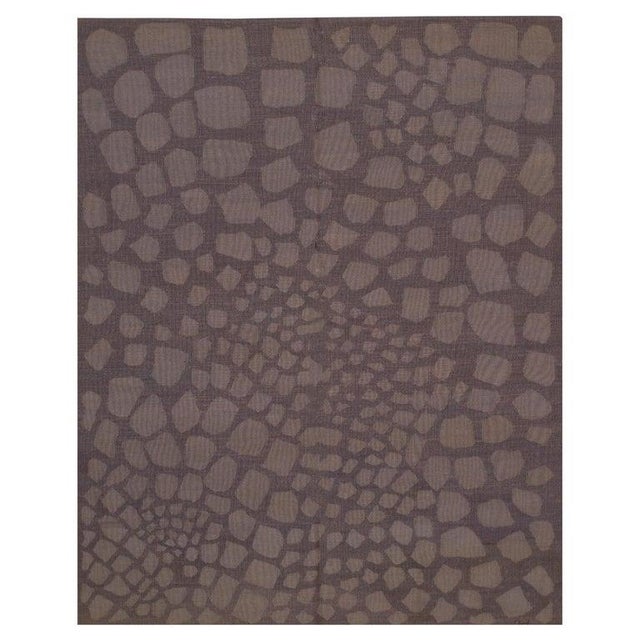 This purple wool rug features a durable flat weave construction consistent with Kilim styles. The primary color palette...