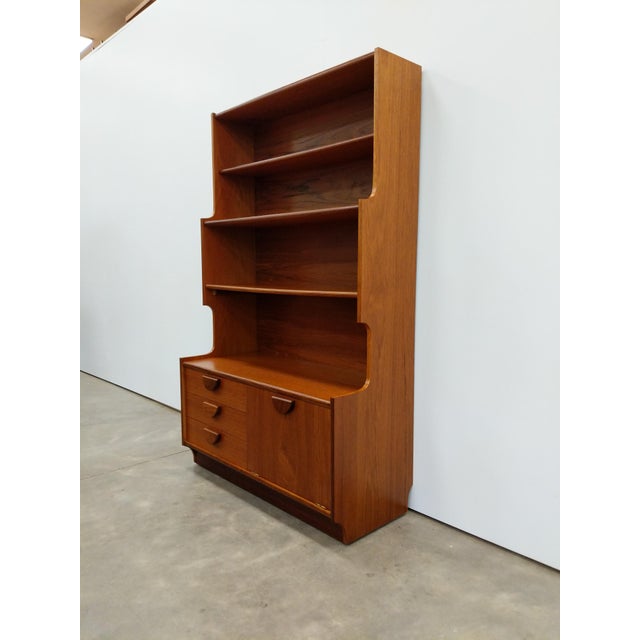 Authentic vintage mid century modern teak sideboard / bookshelf / cabinet. By Stonehill Furniture (unmarked). This piece...
