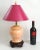 Offering a SMALL Chinese ginger jar table lamp with wood base and vintage magenta cardboard shade, circa 1980s. This...