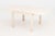 James Mont Style White Painted Extending Dining Table. Extended: 30.25" H x 76" W x 38" D; closed: 31" H x 38" W x 38" D....