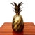 ​​masterpiece of decorative tableware, this ice bucket adopts the iconic silhouette of the pineapple, a historical symbol...