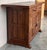 From Northern Spain, constructed of solid oak, the rectangular top with molded edge top a conforming case housing two...