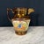This 19th Century English copper lustre pottery pitcher features a rich metallic copper lustre glaze complemented by a...