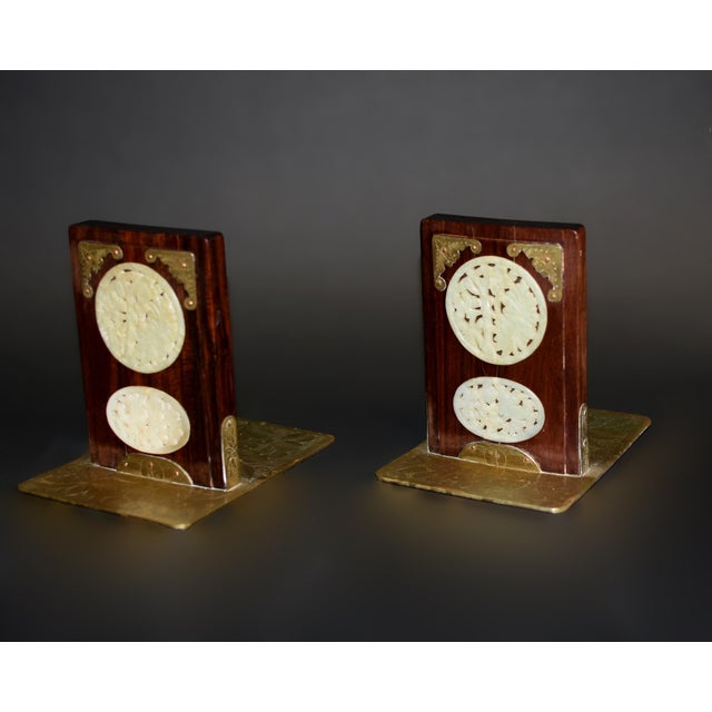 This exceptional pair of antique bookends is a stunning example of fine craftsmanship and rich symbolism. Crafted from...