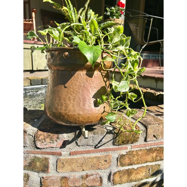 A beautifully timeworn antique copper lavabo reservoir, rich with the kind of patina only a century of use can create....
