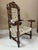 An exceptionally elaborate French carved oak armchair in the Louis XIII style, circa 1860, accompanied by a certificate...