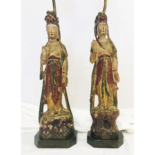 Gorgeous pair of 19th century Quan Yin figures. These antique figures are made of hand carved wood with a polychrome...