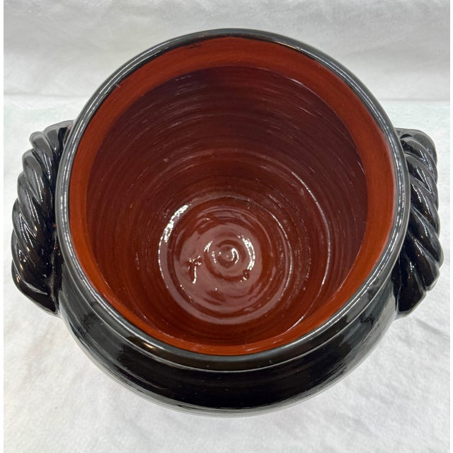 Ned Foltz 2000 Signed Redware Flared Rim Closed Twisted Rope Handled Urn Cachepot, Bird Motif, Black Glaze, Burnt Umber, Blue, Yellow Slip Decorated For Sale - Image 11 of 12