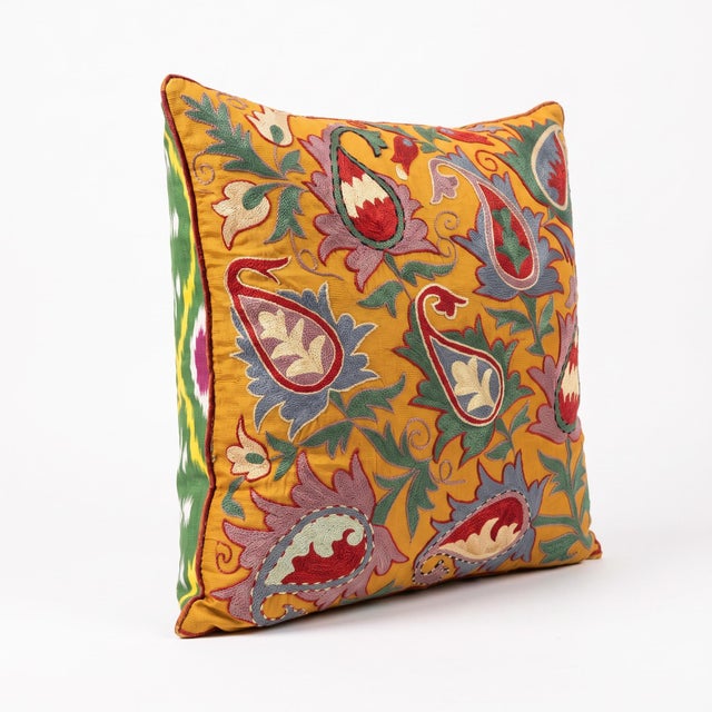 This beautiful hand embroidered suzani fabric is sourced from Uzbekistan. We cut and sew the pillow by hand in our Houston...