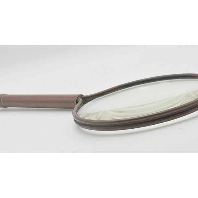 A striking industrial optical inspection magnifier constructed from copper, iron, and glass, dating to the early-to-mid...