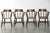 We are offering this set of four antique English wooden pub/captain chairs from the late 19th century, featuring character...