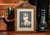 This is an original World War I era, framed portrait photograph of a young man in British military uniform. The portrait...