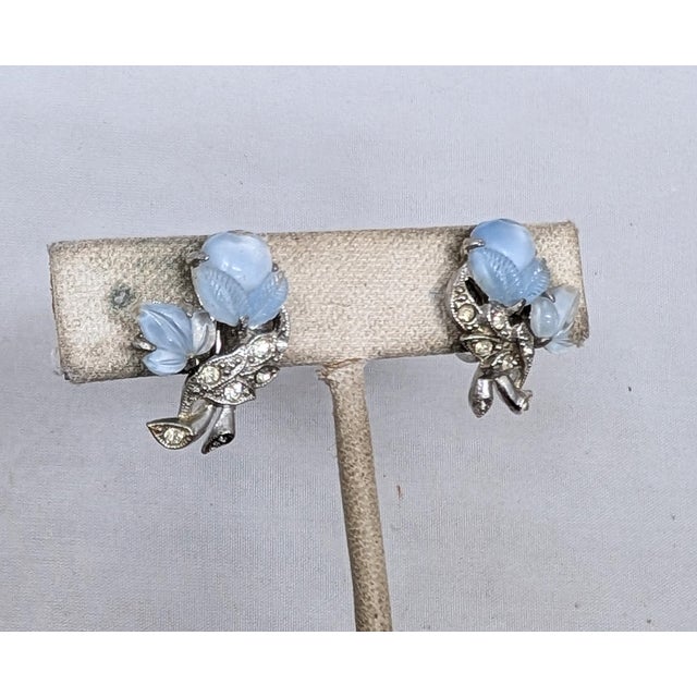 1930s rhodium plated molded "tutti frutti" blue glass acorn and leaf with round clear rhinestone accents screw back...